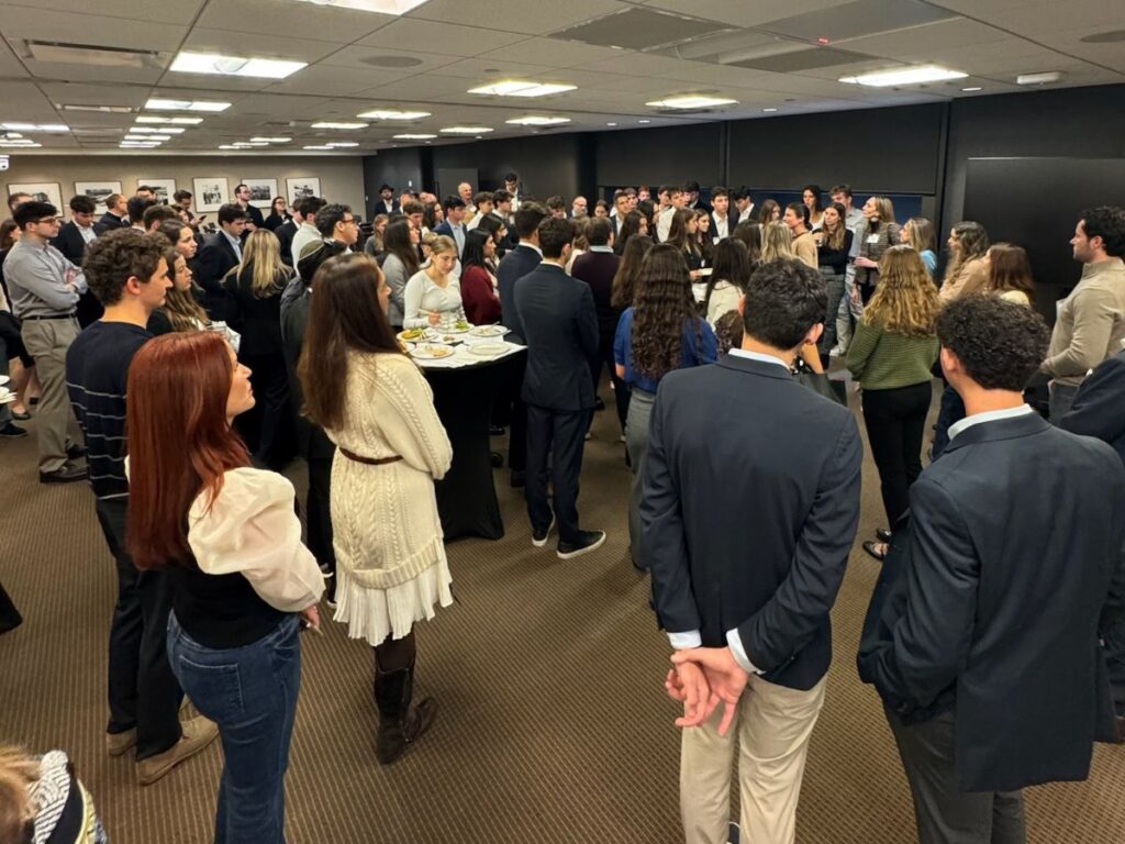Penn JHP students and mentors networking at the mentoring luncheon in New York