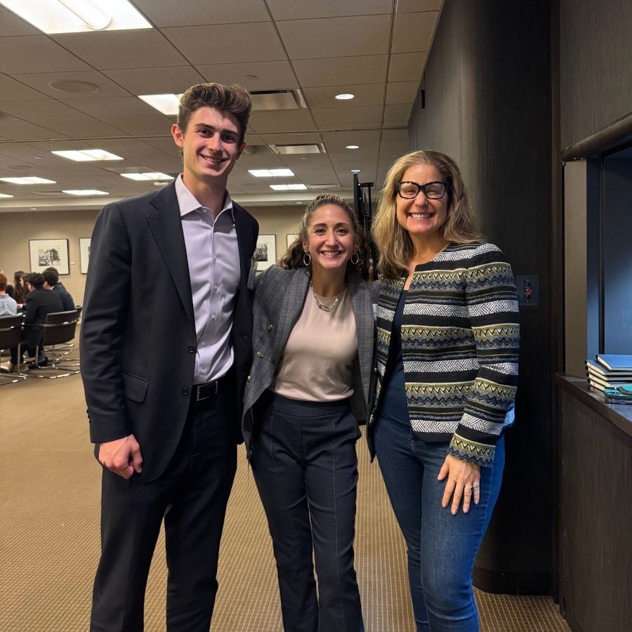 Two Penn JHP students with their mentor at the NYC mentoring retreat