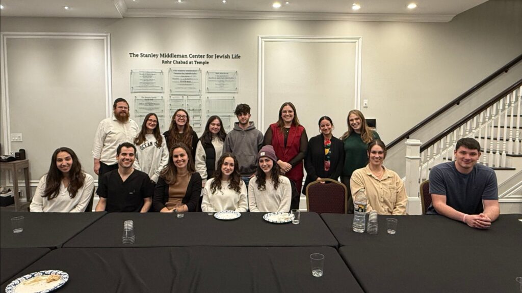 JHP Temple students and JBN mentors gathered around the table at a networking panel